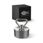 Product photo of Hardcore fishing magnet with stainless steel eyebolt and protective housing, displayed with branded storage box for magnet fishing and metal recovery.