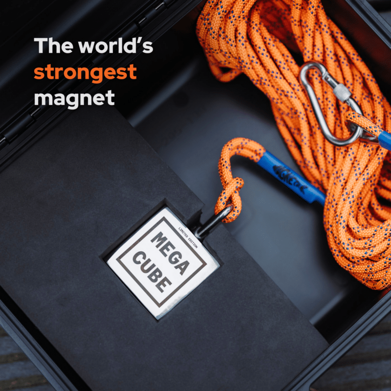 USP image of Mega Cube neodymium fishing magnet stored in a protective hard case with braided rope, designed for extreme magnet fishing performance and strength