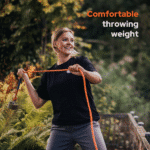 Lifestyle image of Hardcore fishing magnet in use, showing comfortable throwing weight during magnet fishing with an orange recovery rope outdoors.