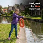 Child magnet fishing by a canal with orange rope, designed as a safe introduction to magnet fishing